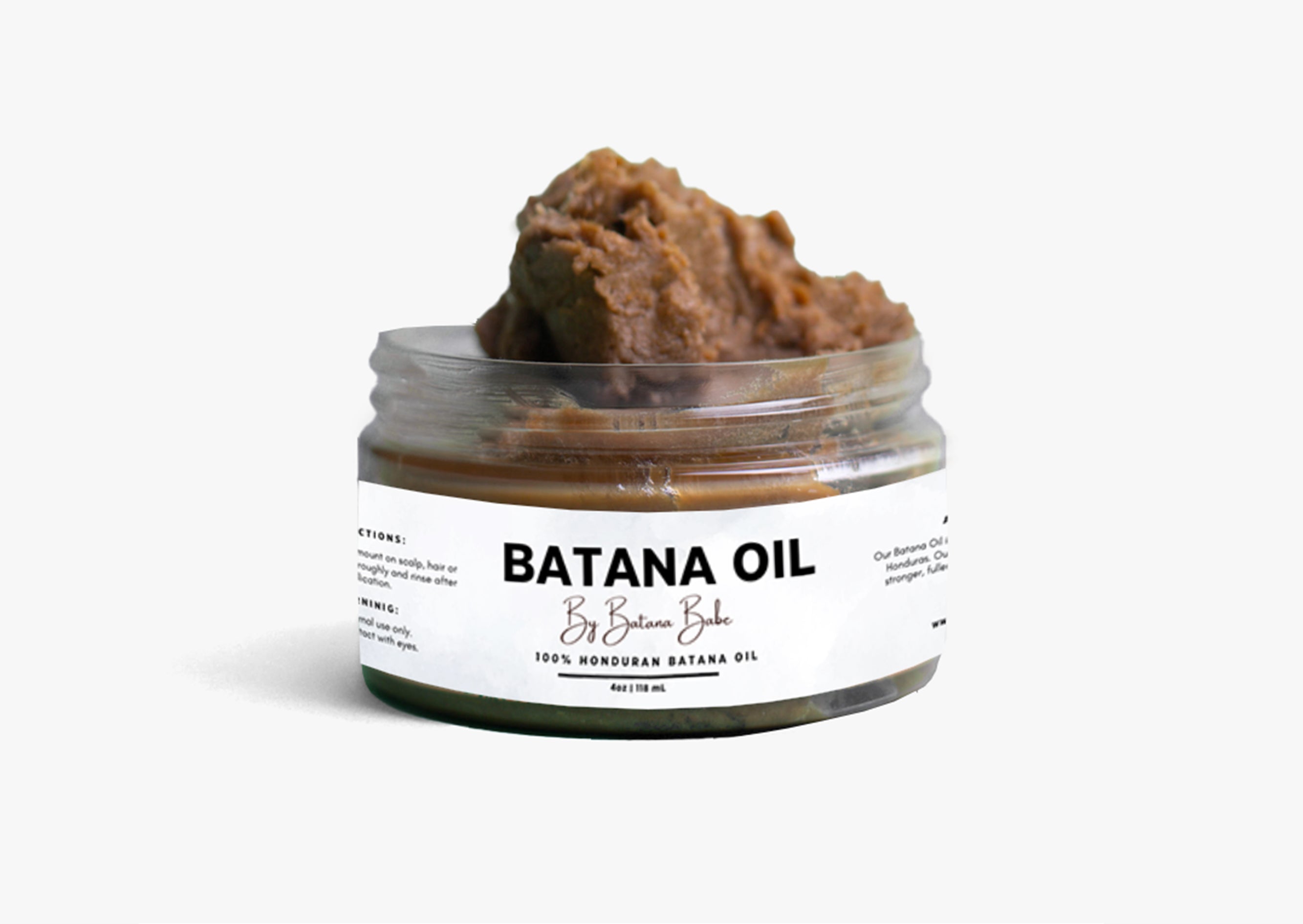 This is our batana oil in an open jar