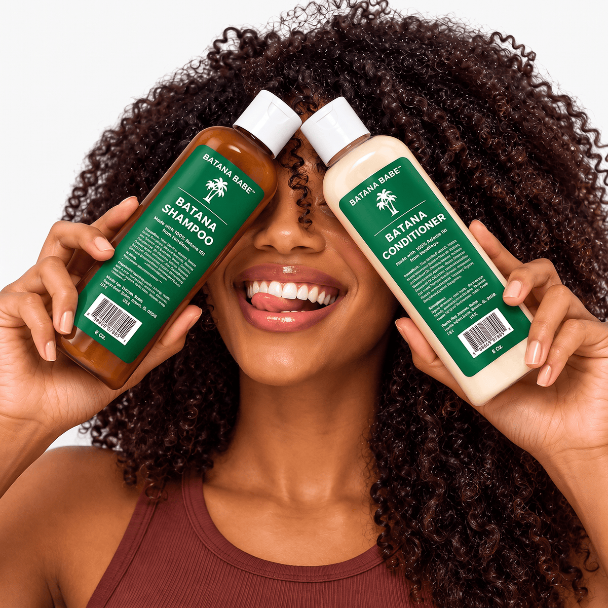 model with batana shampoo and conditioner